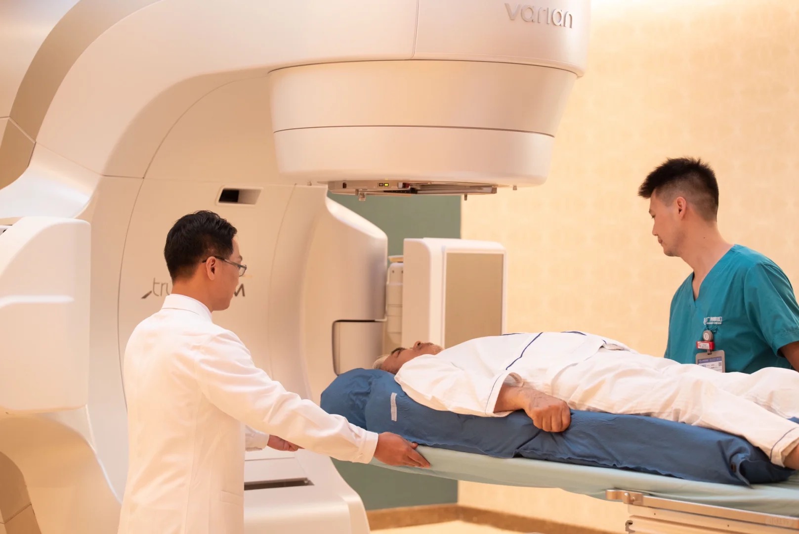 Radiation therapist and physician preparing a patient for TrueBeam treatment at GCCC