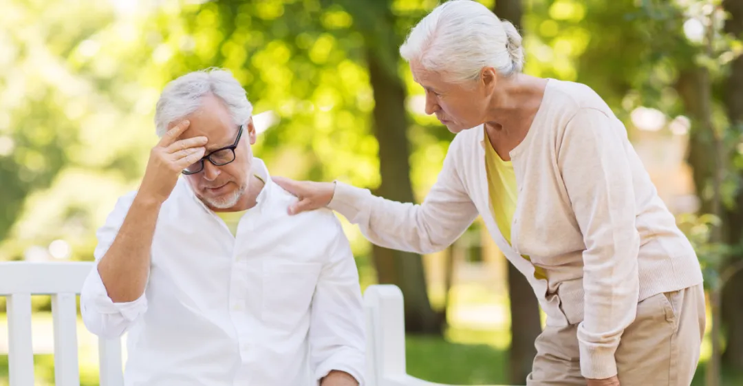 Elderly patient suffering from trigeminal neuralgia — the condition most commonly affects middle-aged and older adults, with average onset between 53-57 years