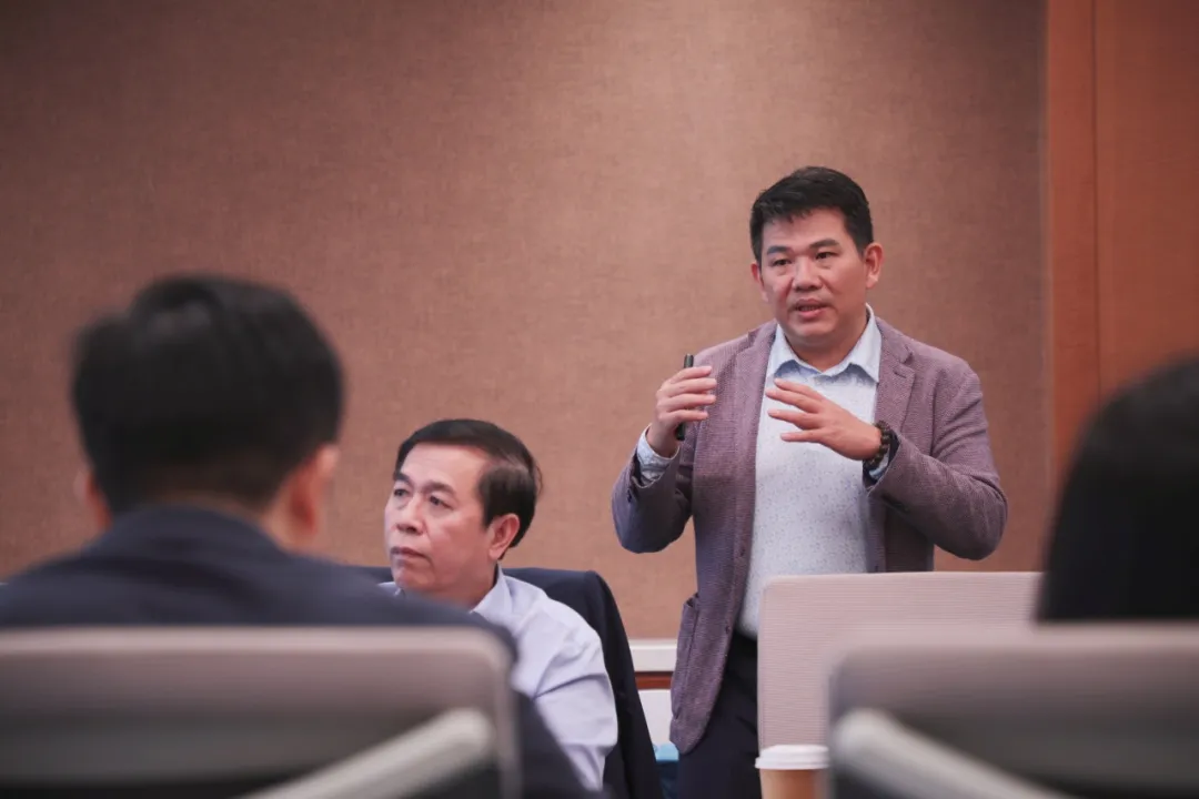 Dr. Eav Sokha speaking at the symposium on Cambodia's radiotherapy resource gap